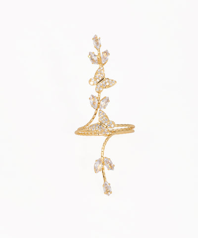 Gold-tone full-finger ring with sparkling butterfly and vine design.