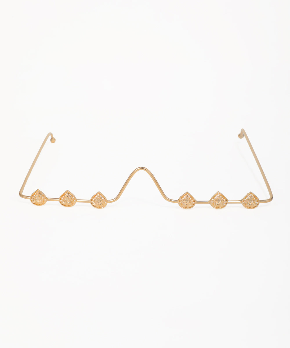 Gold-tone facelet with six ornate heart-shaped motifs on a delicate wire frame and side arms