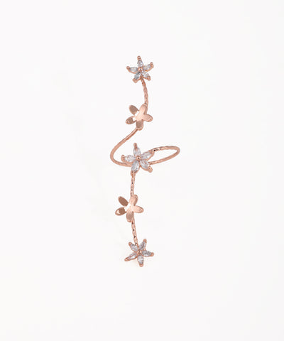 Rose-gold-tone ring with twisting floral vine and clear sparkle stones