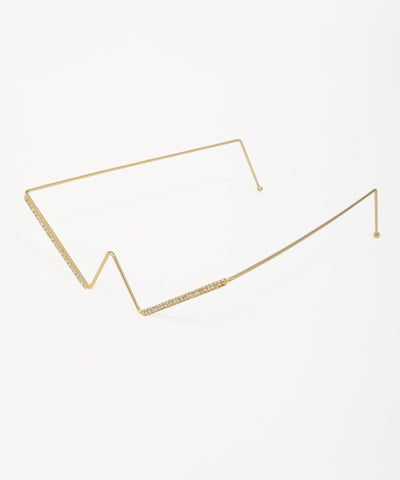 Gold-tone facelet with geometric V-shape and clear stone accents