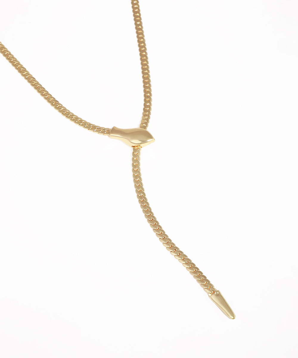 Gold necklace on a white background