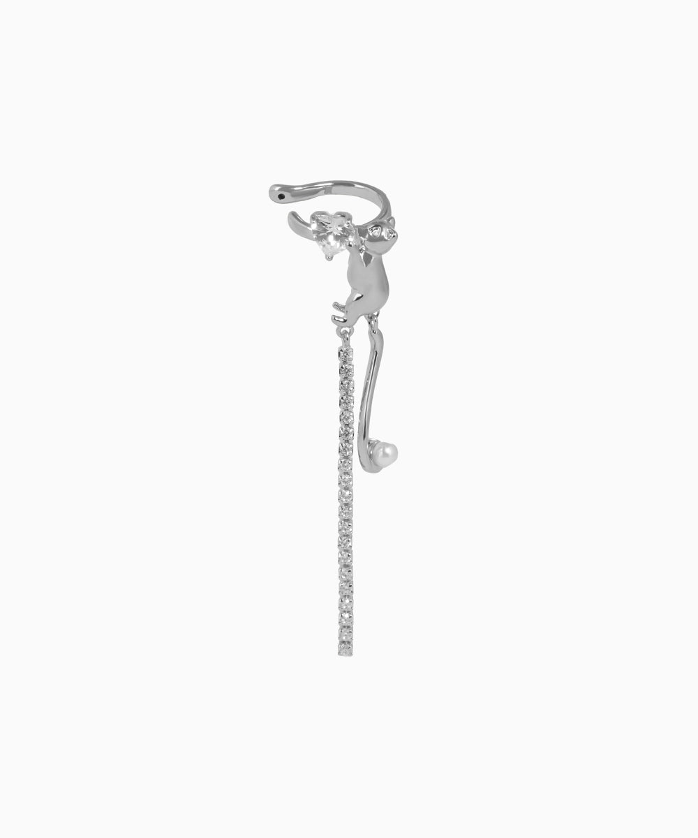 Silver earring with chain and pearl on a white background