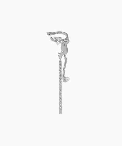 Silver earring with chain and pearl on a white background