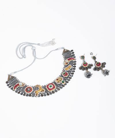 Oxidized silver-tone necklace set with gold-tone animal motifs, colorful enamel, and faux pearls