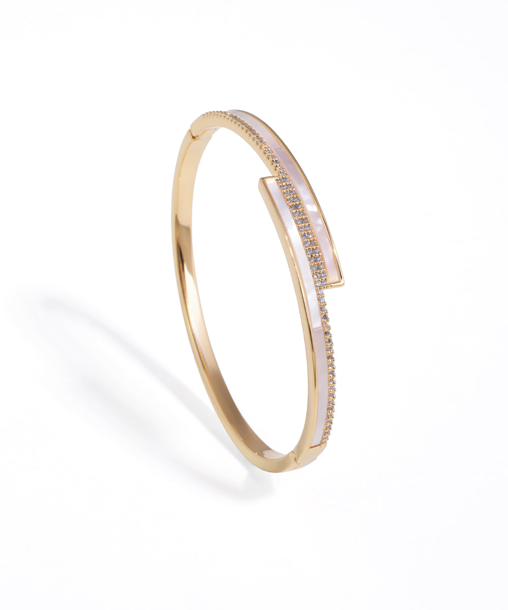 Gold-tone bracelet with iridescent inlay and pave-set clear stones