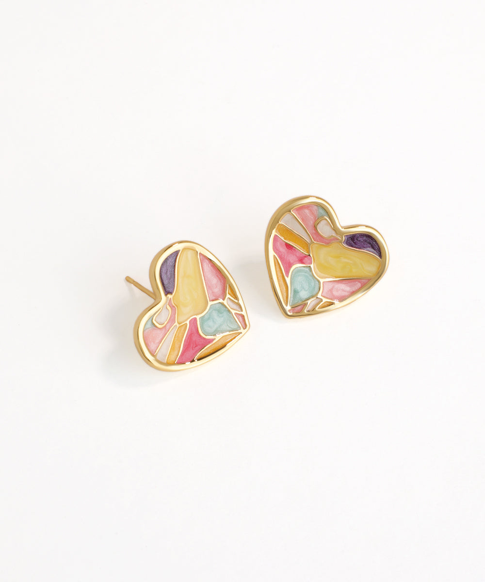 Heart-shaped earrings with colorful design on a white background