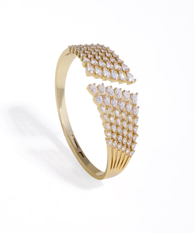 Gold-tone bracelet with sparkling multi-row teardrop cubic zirconia stones in an open-front design