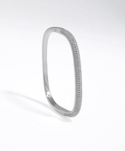 Silver bracelet with small stones on a white background