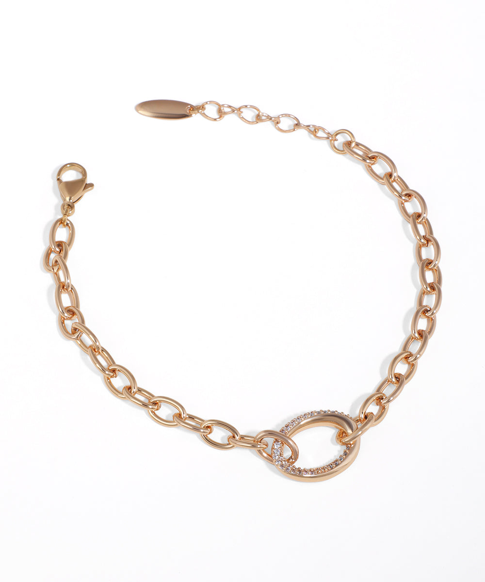 Rose-gold-tone chain bracelet with pavé CZ oval link and lobster clasp