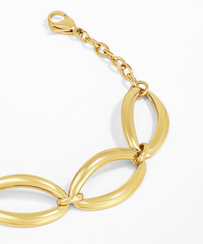 Gold bracelet on a white background