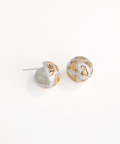 Pair of gold and silver spherical earrings on a white background