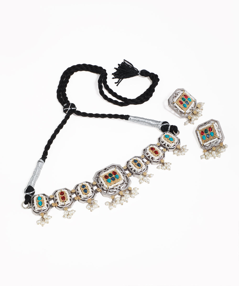 Oxidised silver-tone necklace set with square motifs, colorful stones, and faux pearl drops