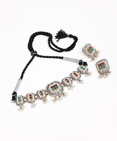 Oxidised silver-tone necklace set with square motifs, colorful stones, and faux pearl drops