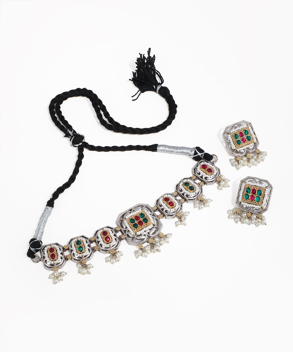 Decorative necklace with tassel on a white background