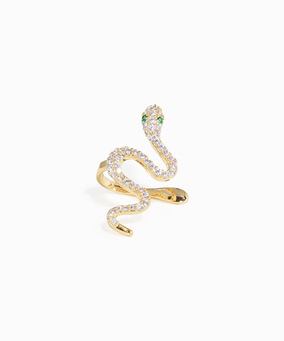 Gold snake-shaped earring with gemstones on a white background