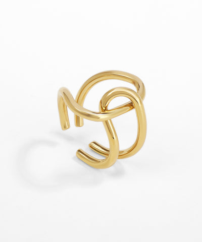 Gold ring with a unique design on a white background