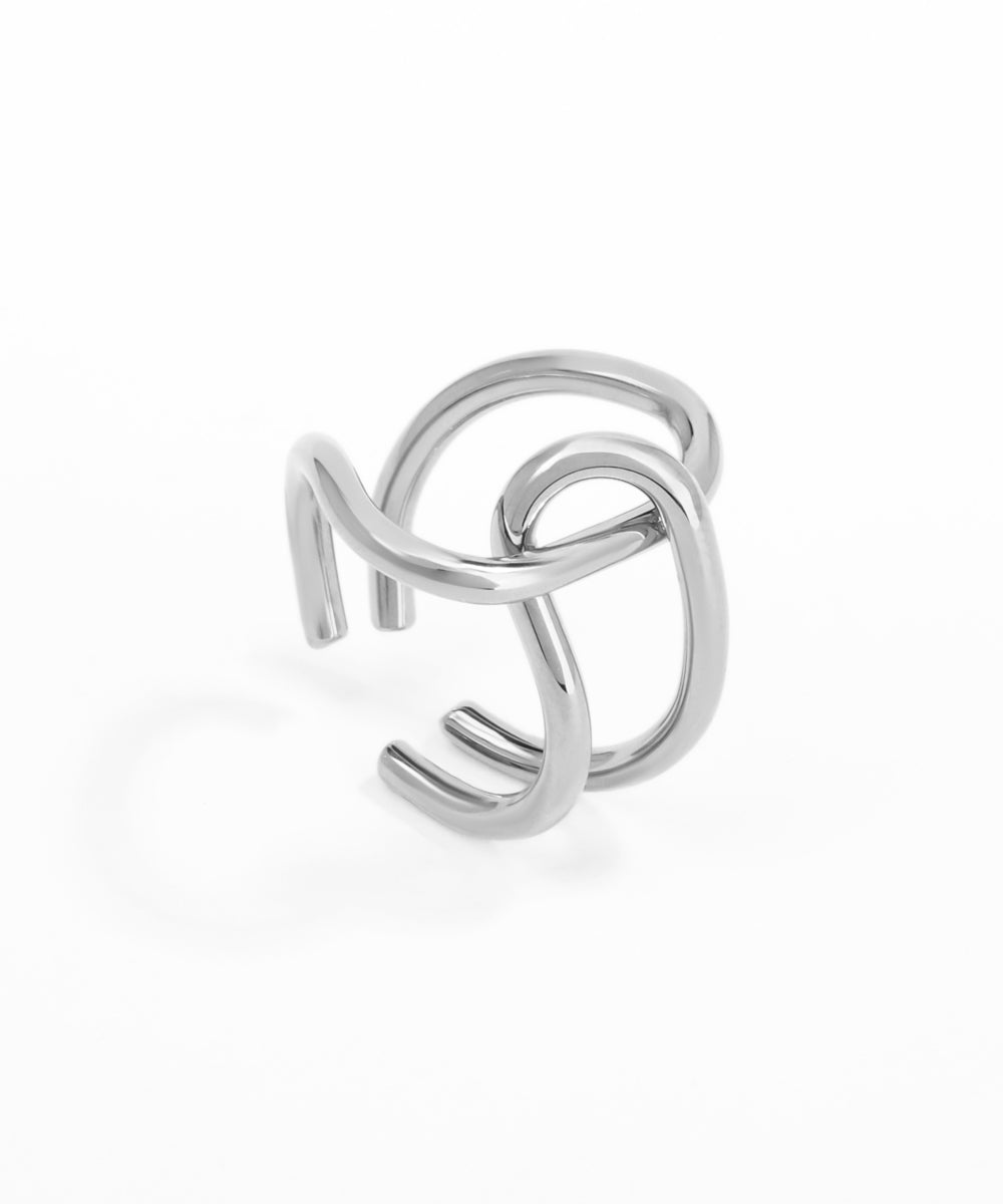 Silver ring with a modern design on a white background