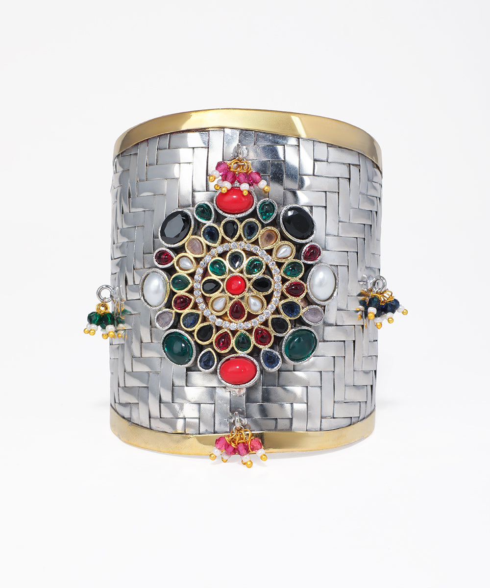 Decorative bracelet with multicolored gemstones on a white background