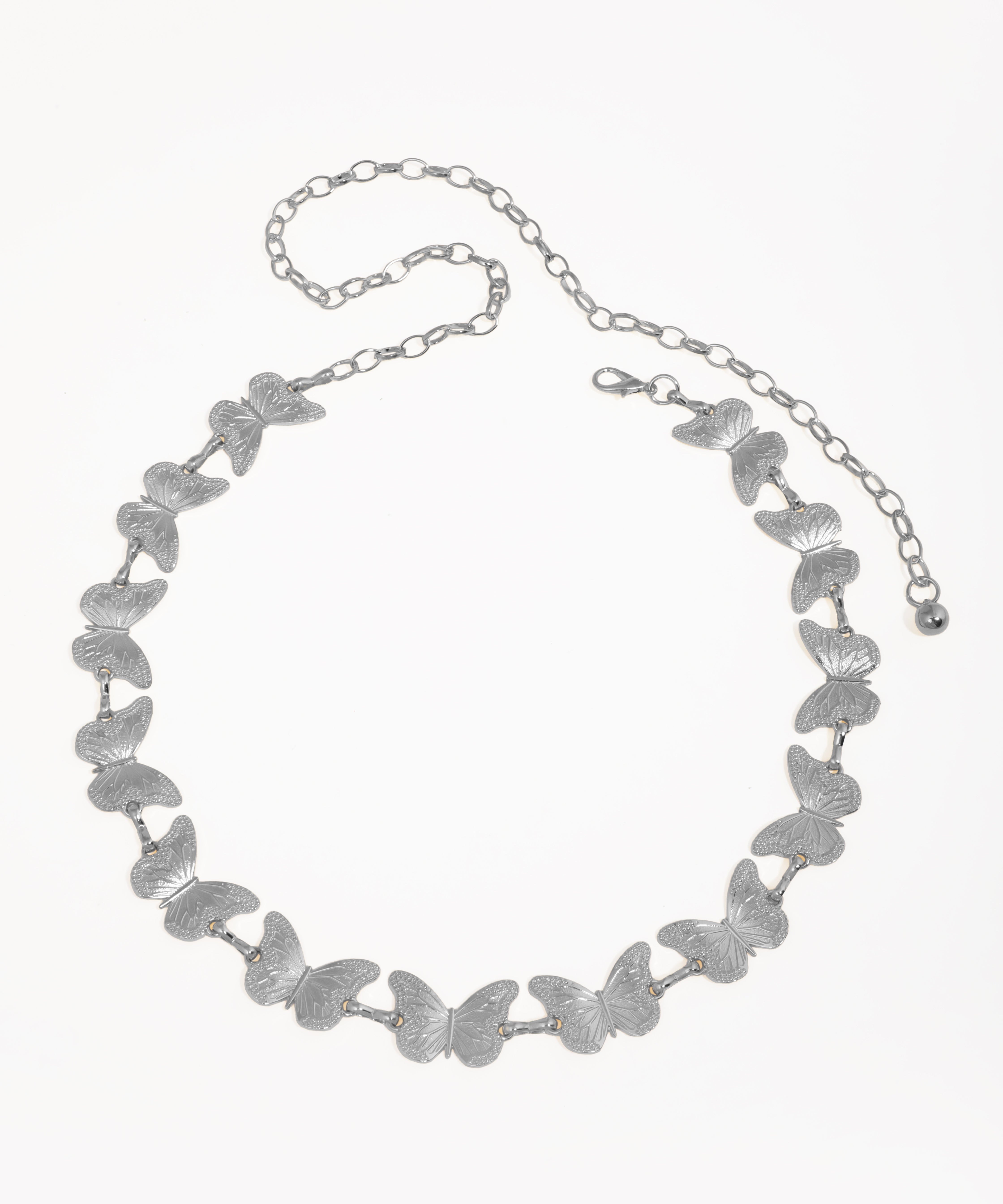 Silver butterfly necklace on a white background