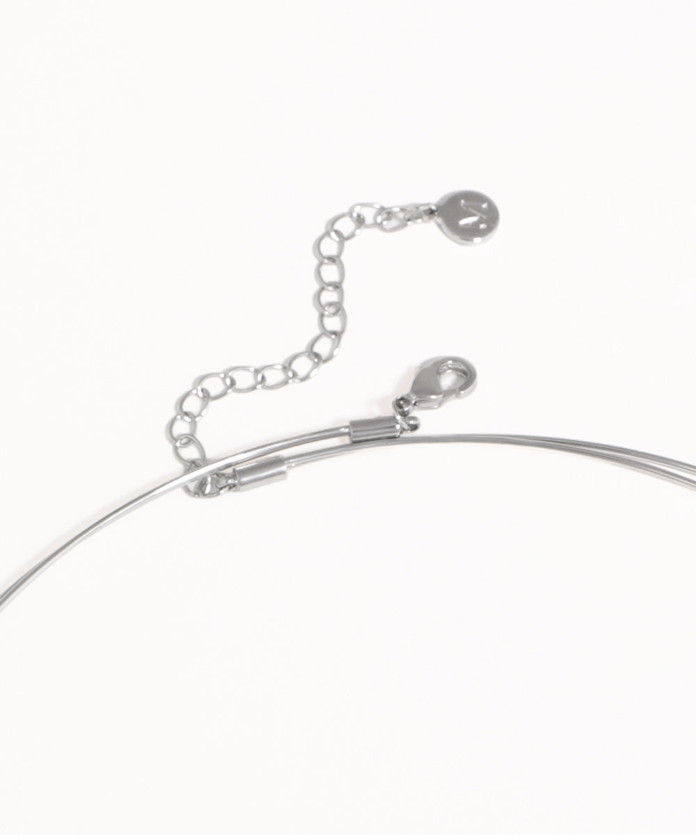 Silver necklace with a clasp on a white background