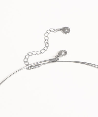 Silver necklace with a clasp on a white background