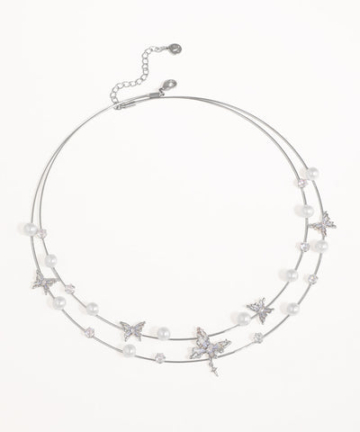 Rhodium finish necklace with faux pearls, CZ stones, and butterfly motifs on a double strand design.