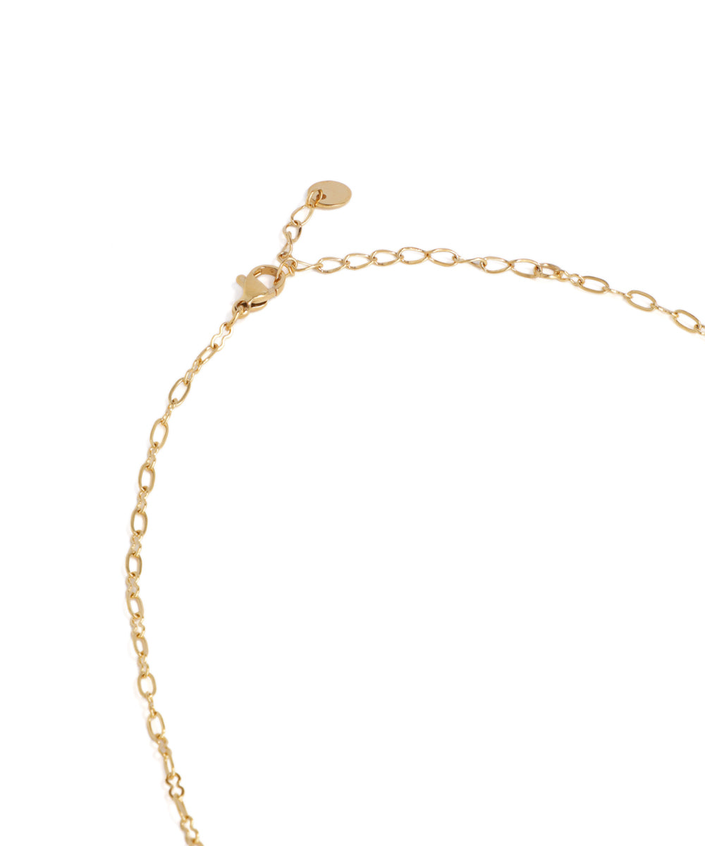 Gold chain bracelet on a white background