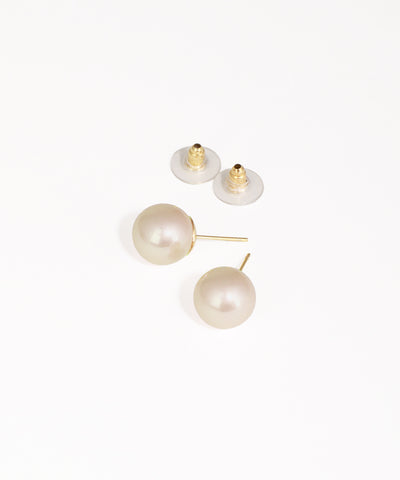 Pearl earrings with gold posts on a white background