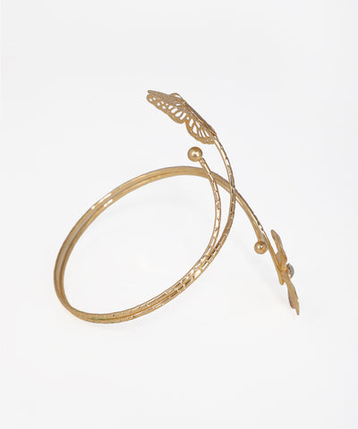 Gold bracelet with leaf designs on a white background