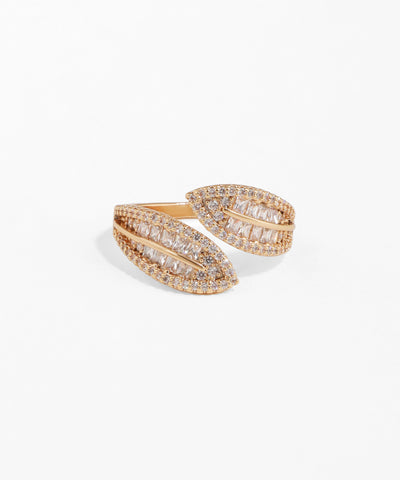 Rose gold ring with diamond accents on a white background
