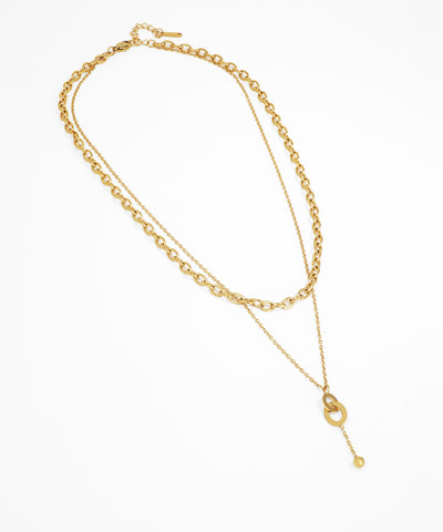 Gold chain necklace on a white background