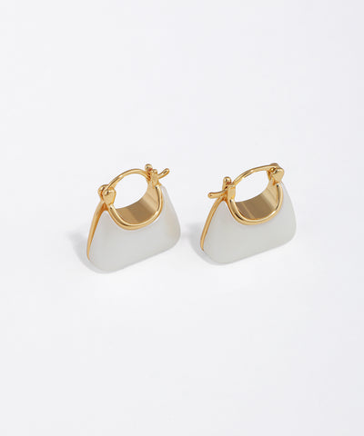 Gold-tone hoop earrings with white enamel mini bag design
