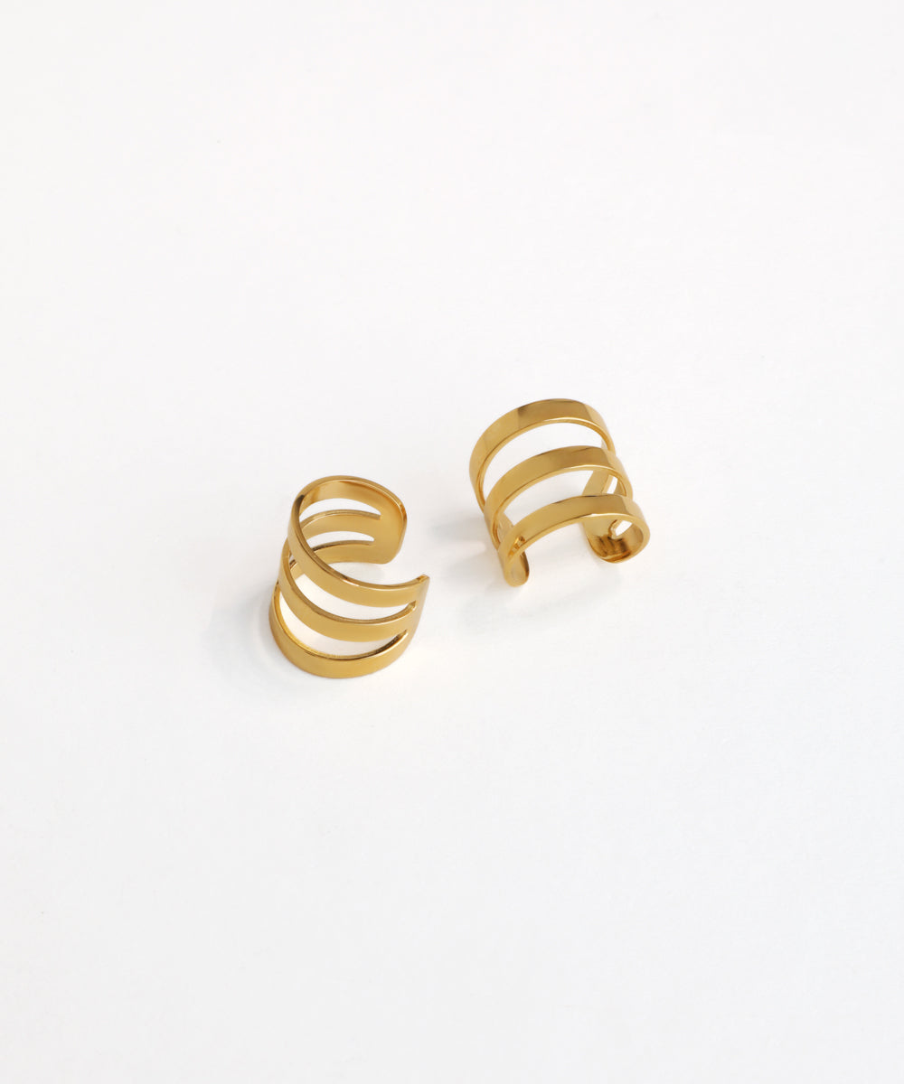 Pair of gold hoop earrings on a white background
