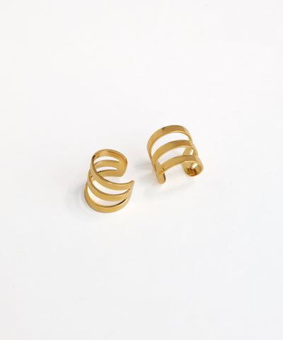 Pair of gold hoop earrings on a white background