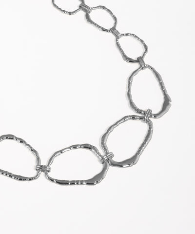 Silver chain necklace on a white background