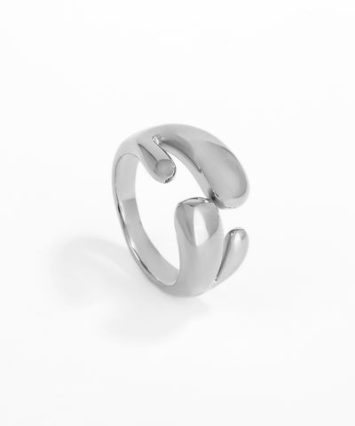 Silver open ring on a white background