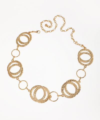 Gold-tone waist chain with large interlocked textured circles and small plain linking rings