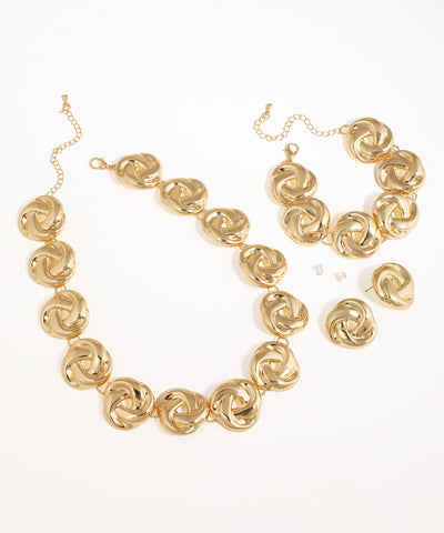 Gold-tone necklace set with chunky interlocking knot links and matching earrings and bracelet.