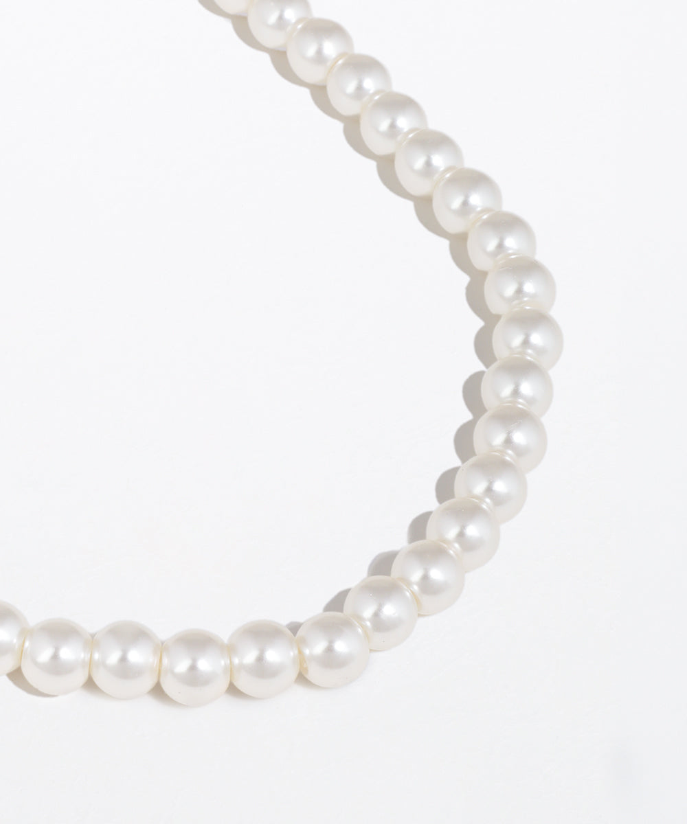 Pearl necklace on a white background