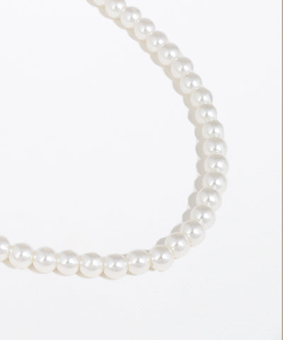 Pearl necklace on a white background