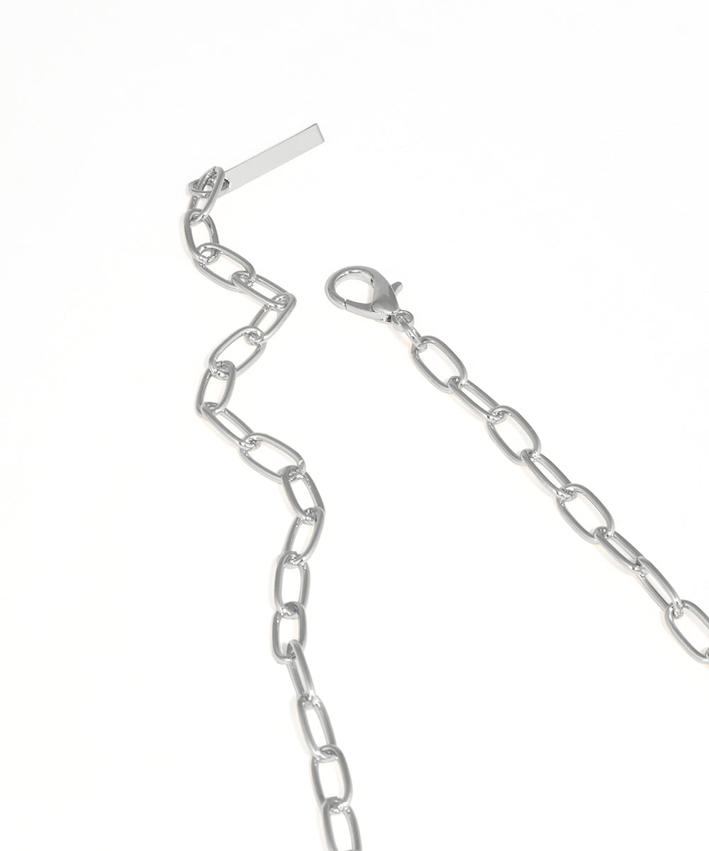 Silver chain necklace on a white background