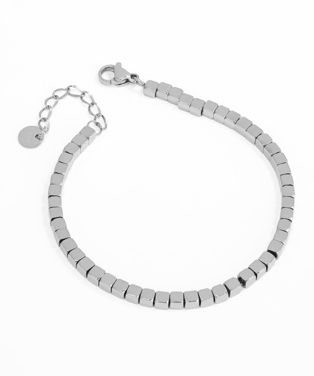 Silver beaded bracelet on a white background