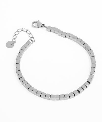 Silver beaded bracelet on a white background