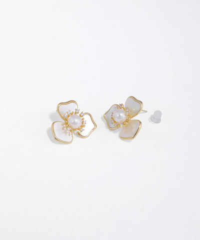 Gold-tone floral stud earrings with iridescent petals, a central faux pearl, and surrounding clear CZ stones.