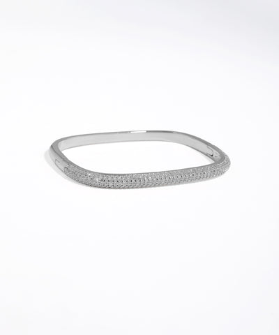 Silver bracelet with small stones on a white background