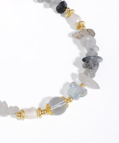 Necklace with multicolored beads on a white background