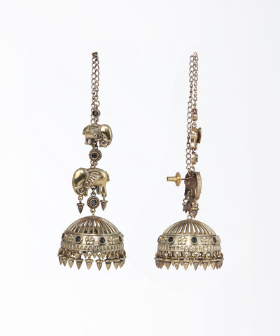 Pair of ornate gold earrings with intricate designs on a white background