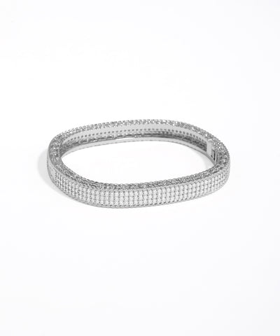 Silver bracelet with small stones on a white background