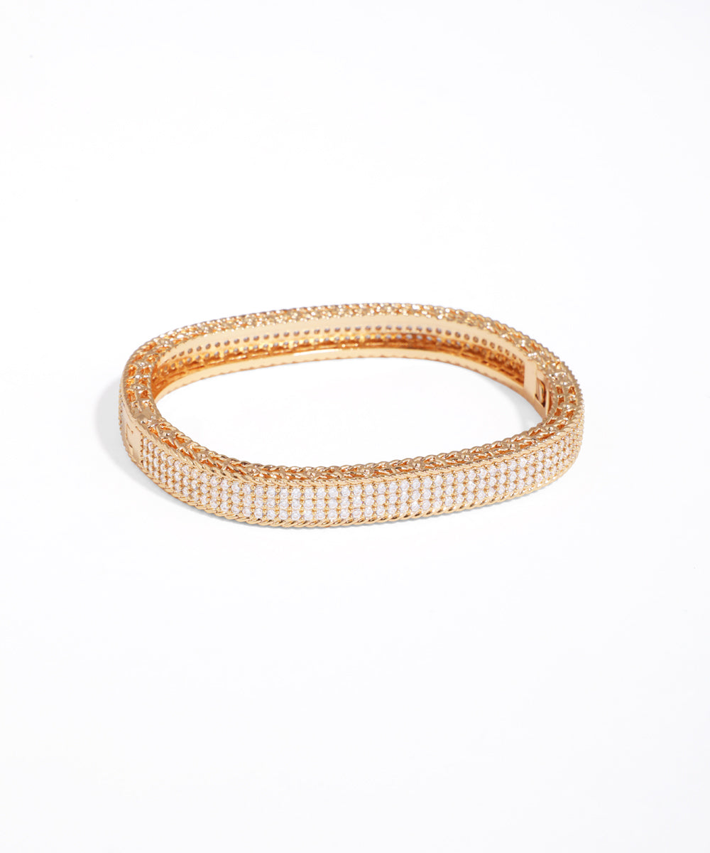 Rose gold bracelet with clear stones on a white background