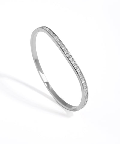 Silver bracelet with small stones on a white background